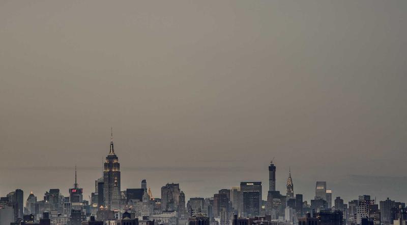 A city skyline in haze